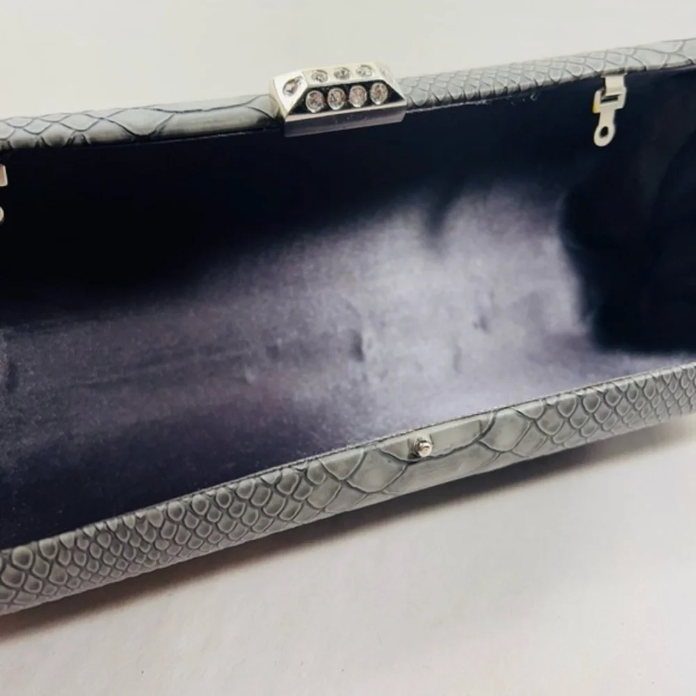 Beautiful python textured clutch with diamond/ silver accent closure